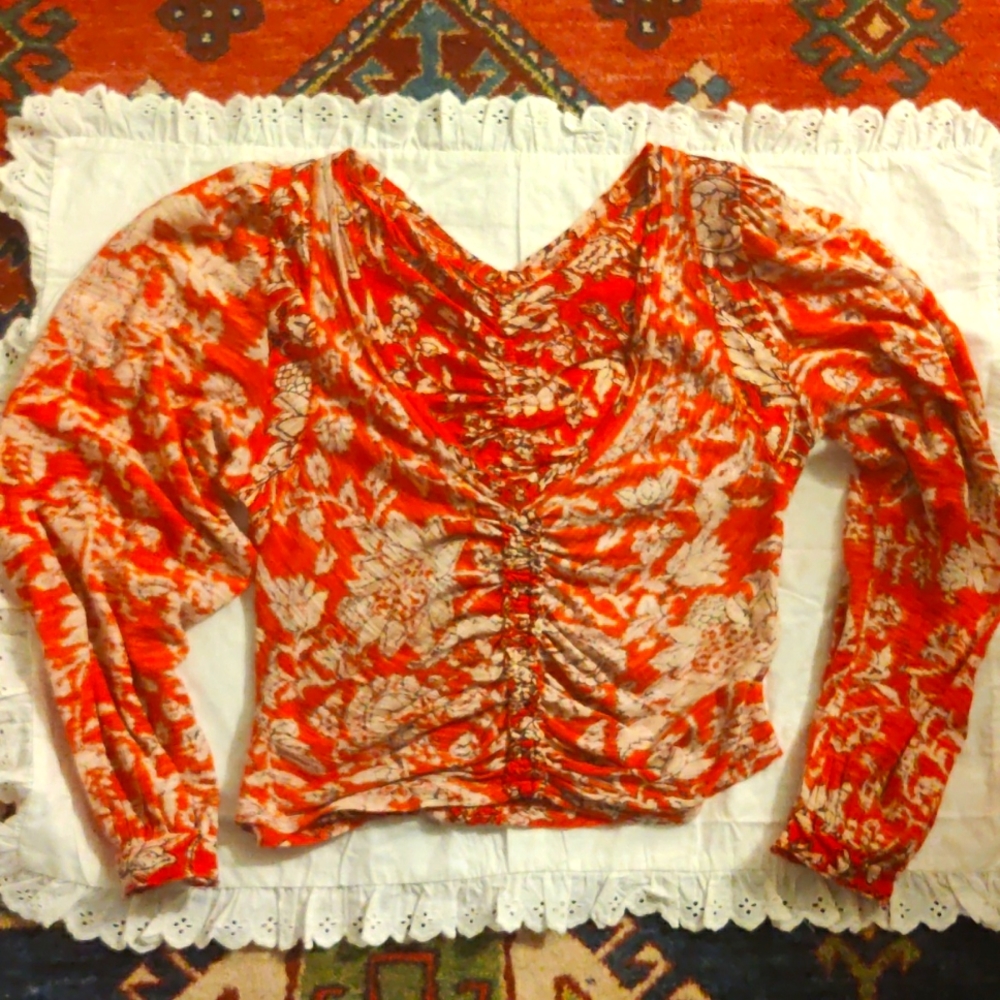 Free People top size S. Color orange/cream. Cotton/modal. Made in India.